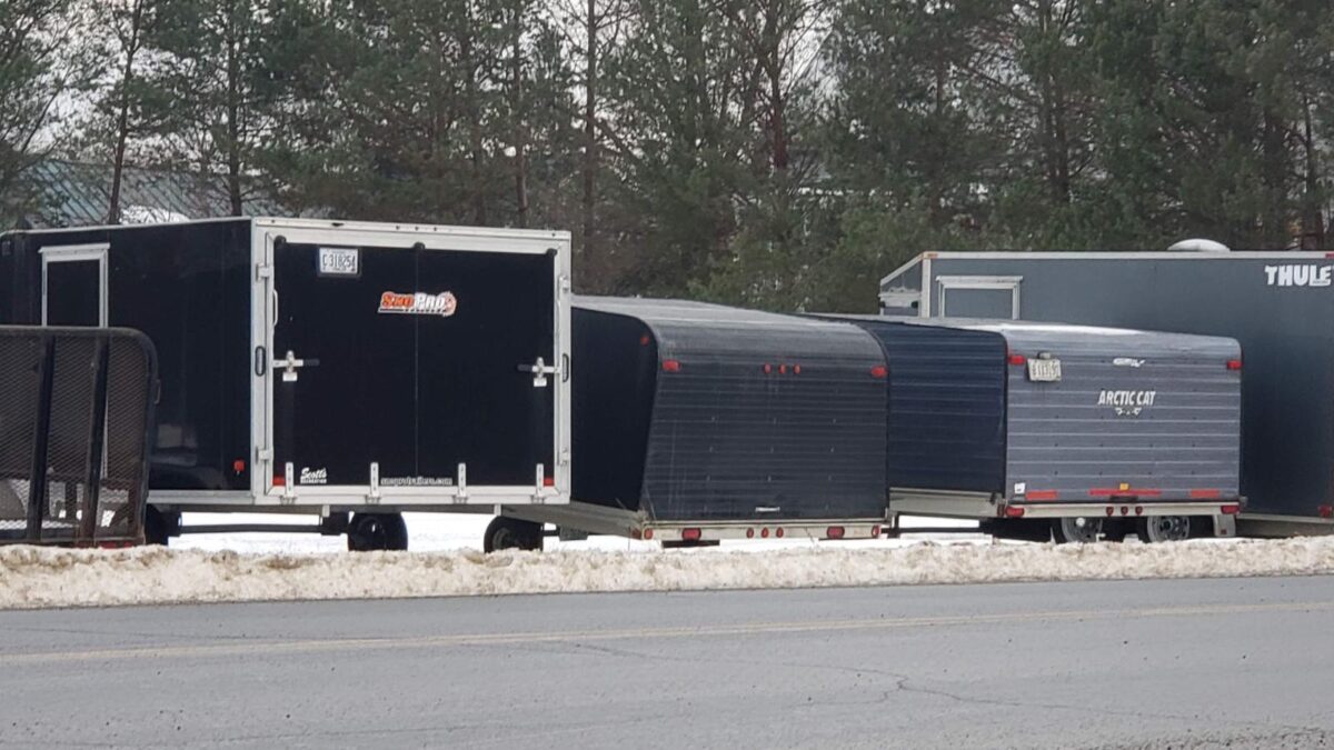 snowmobile trailers arriving in our rural town